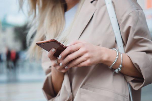 A lady uses her Apple iPhone