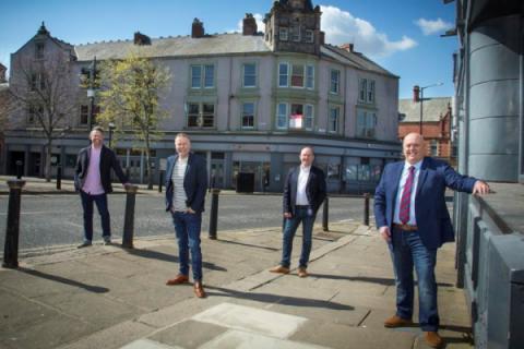 4 men stand in Sunderland city centre