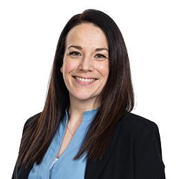 Head and shoulders shot of claire richmond. She is wearing a blue shirt and black blazer.