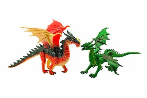 Two toy dragons, one red and black and the other green, on a white background