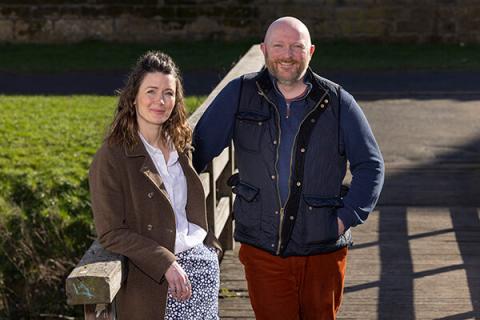 Winter addis and David Towns from Muckle LLP standing left to right on a bridge