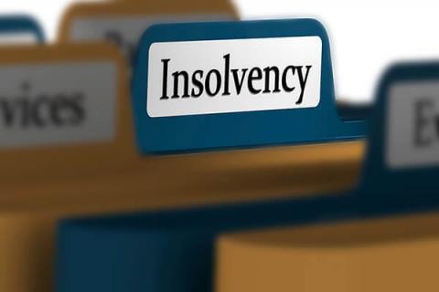 Folder with insolvency written on it