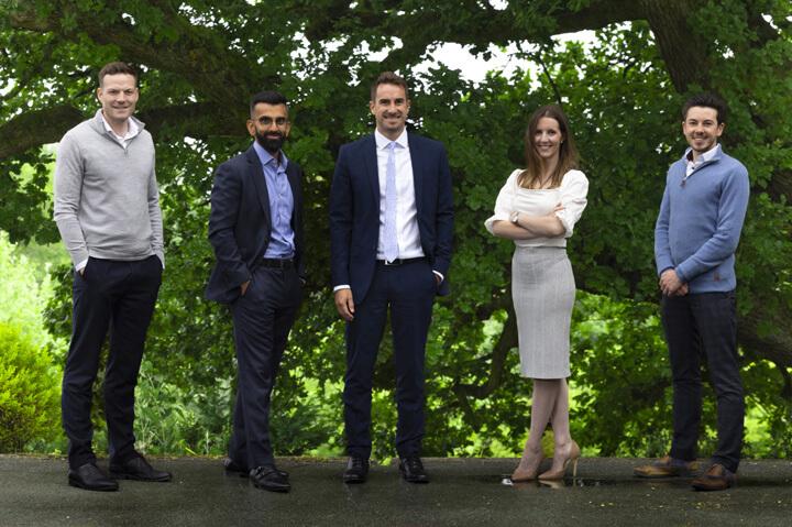 5 people from Muckle, Simpson & Parsons and Cavu standing in a row