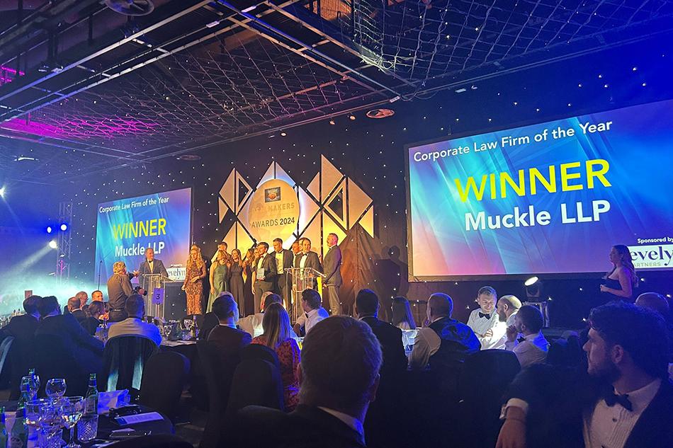 The corporate team accepting their award for Corporate Finance Team of the Year