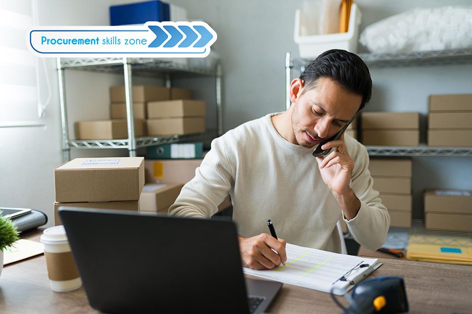 Image of a man in an office managing boxes of products