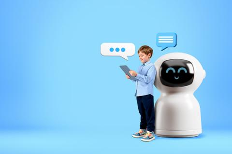 A boy holding an electronic tablet standing beside a large chatbot, with a blue background