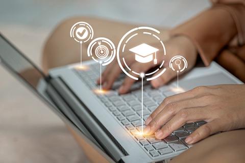 Woman researching school admissions on her laptop