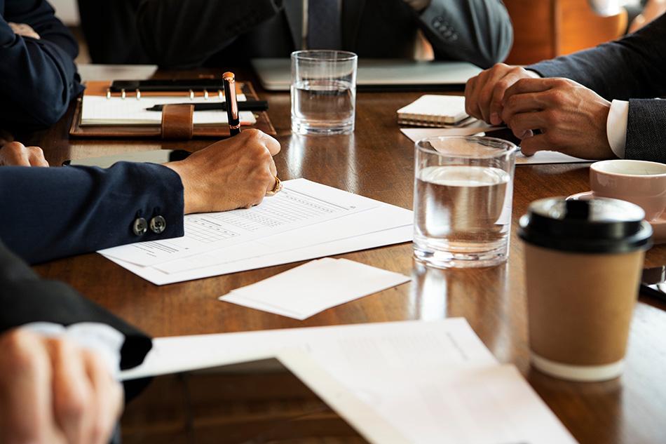 A meeting being conducted by charity trustees