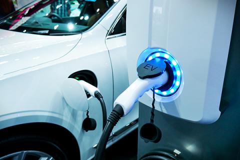 A charging point for an electric vehicle being used by a customer
