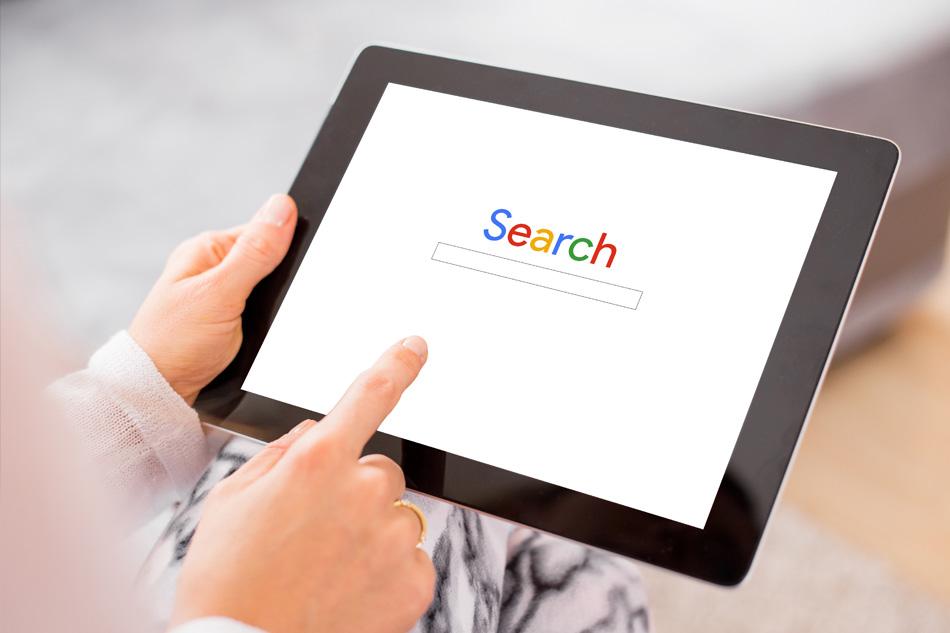 Image of someone using Google search on an ipad