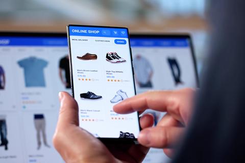 Someone online shopping via their mobile phone