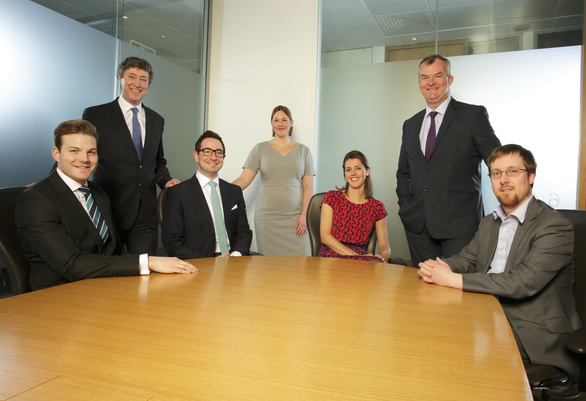 Partners Andrew Davison, Gail Bennett and Jonathan Combe (standing) with the newly promoted Associates.