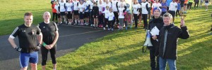 Foreground from left, Tom Williams and Chris Jones from parkrun HQ, then Russell Deane and Ian Kirtley from Newcastle parkrun. Background, Muckle Runners in white & an almost record attendance of 581 runners